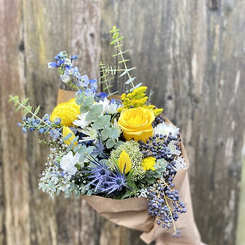 Blue, Yellow, and White wrapped bouquet
